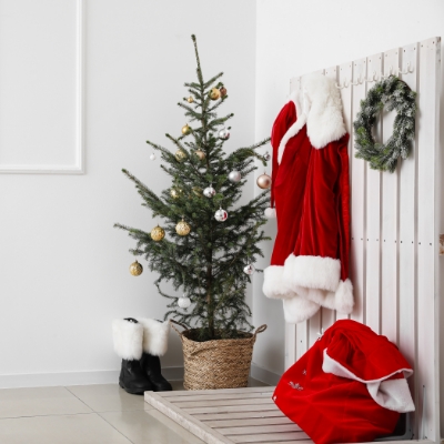 Santa costume and Christmas tree